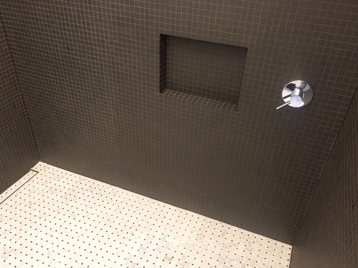 Full-height bathroom wall tiling in Auckland