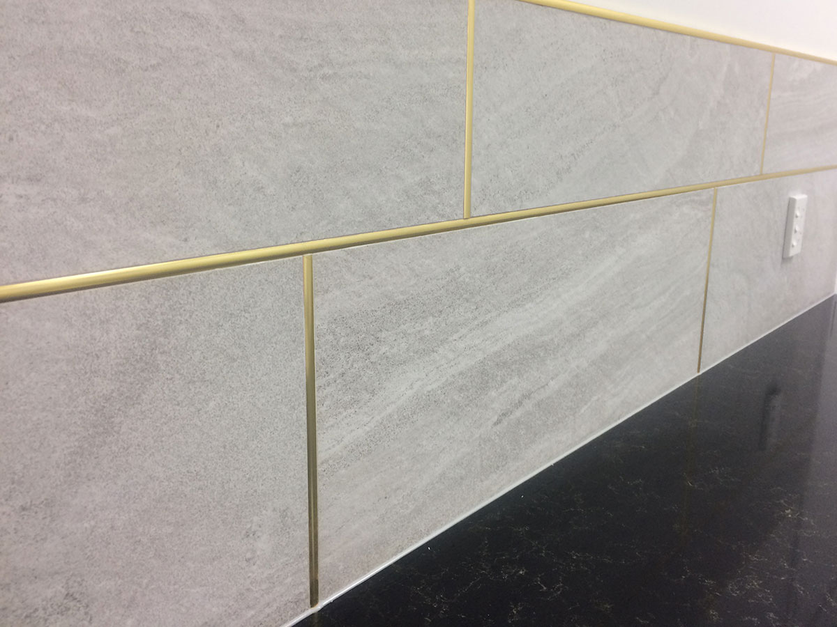 Retiled splashback over an existing surface in Auckland