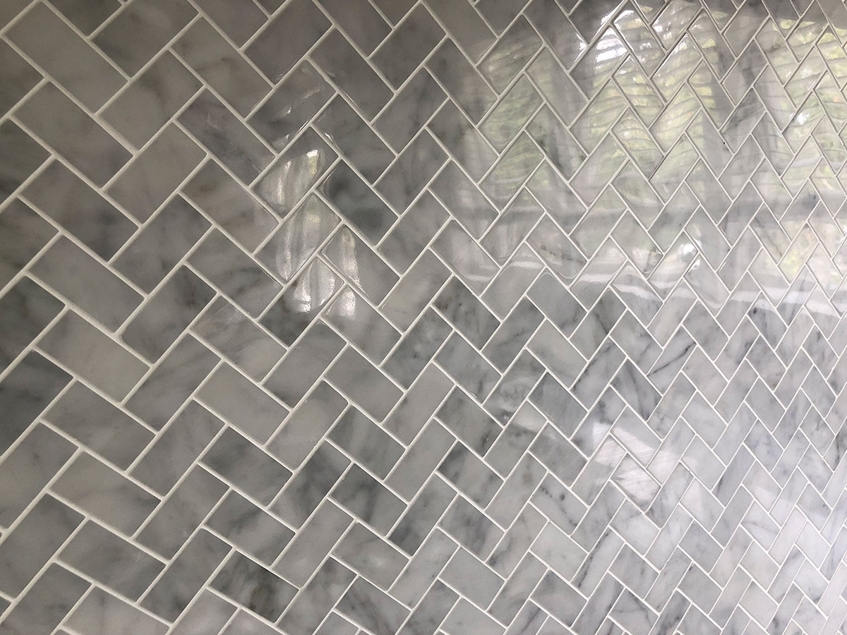 Tiled laundry splash zone in an Auckland home