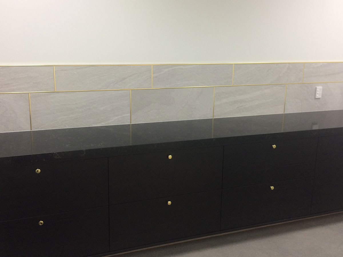 Fresh grout lines on wall tiling in an Auckland bathroom