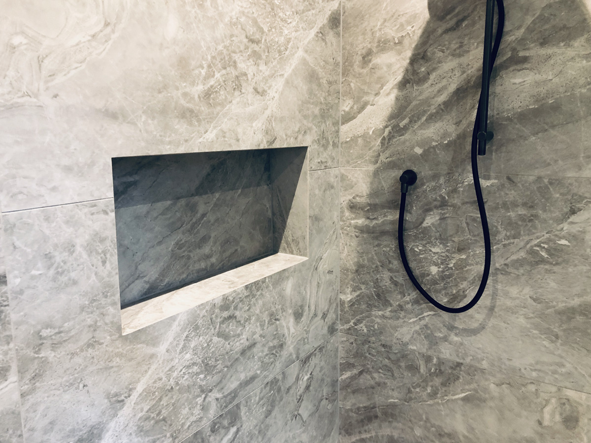 Renovated ensuite bathroom tiling in Auckland