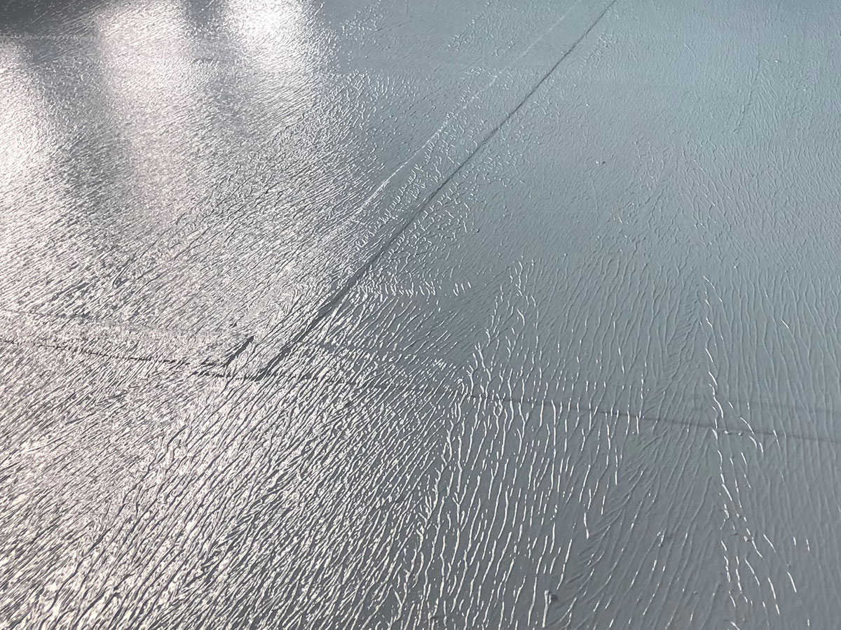 Waterproofing membrane applied to a bathroom floor before tiling in Auckland